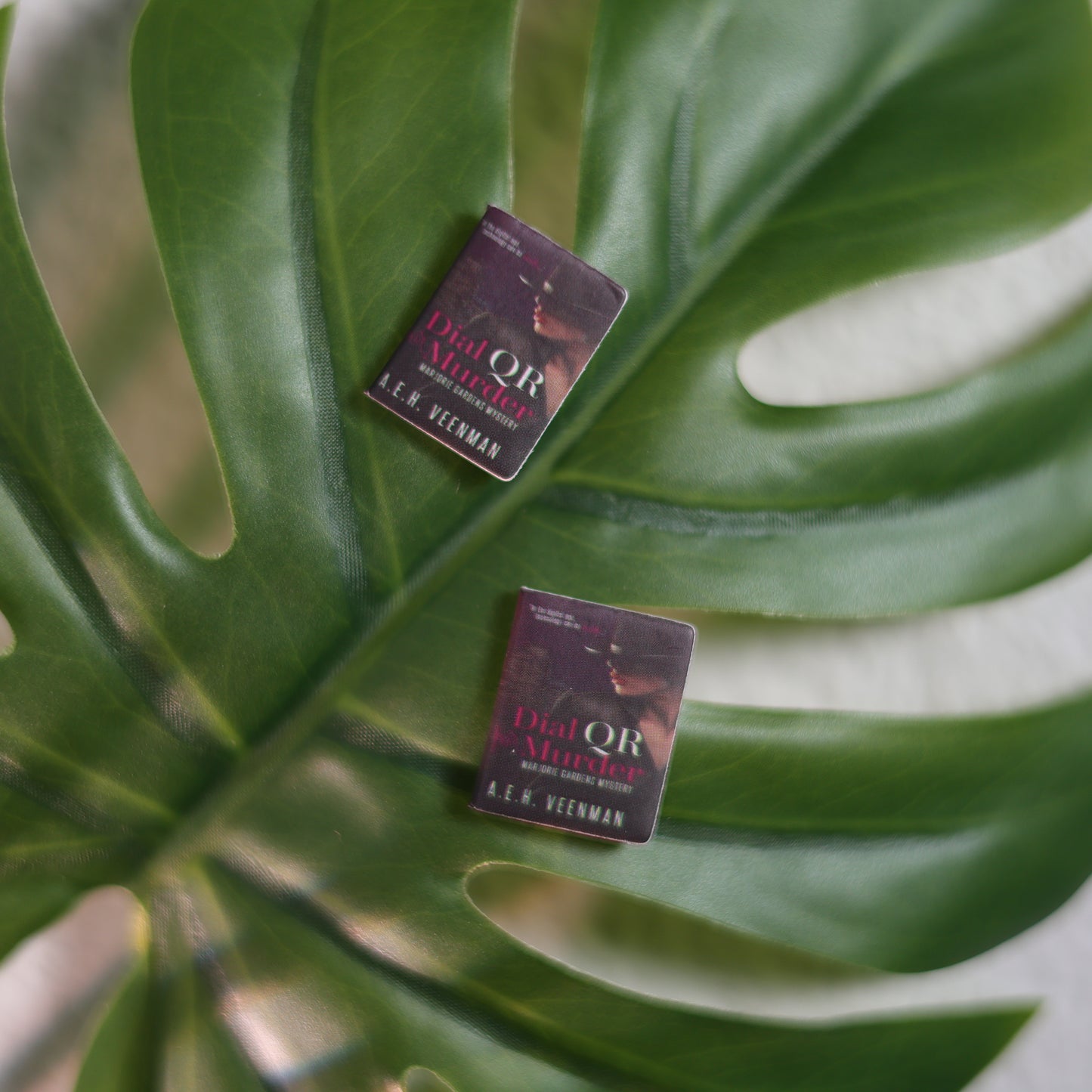 Titled Stud Earrings - A.E.H. Veenan - Dial QR For Murder
