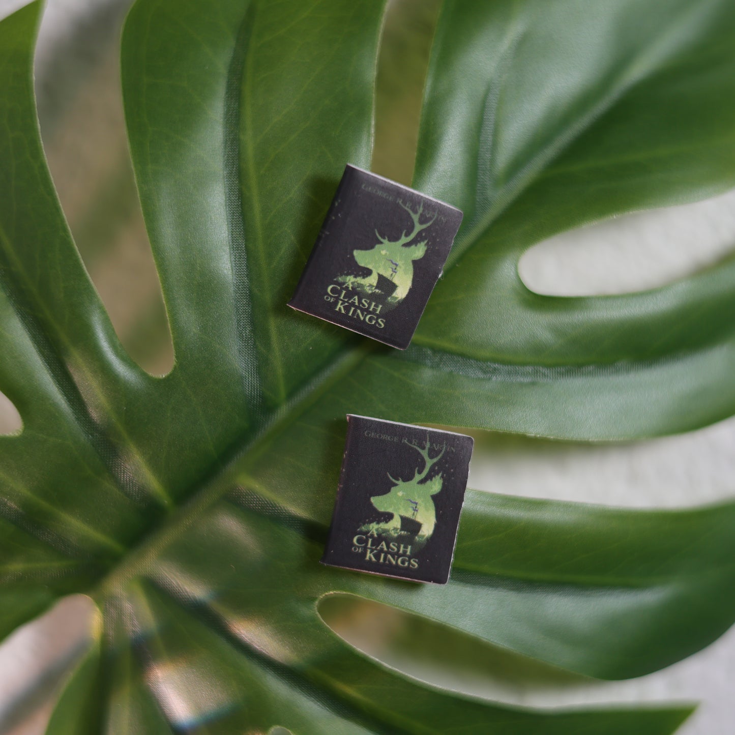 Titled Stud Earrings - George R.R. Martin - A Clash of Kings